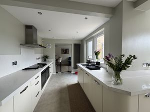 KITCHEN TO FAMILY ROOM- click for photo gallery